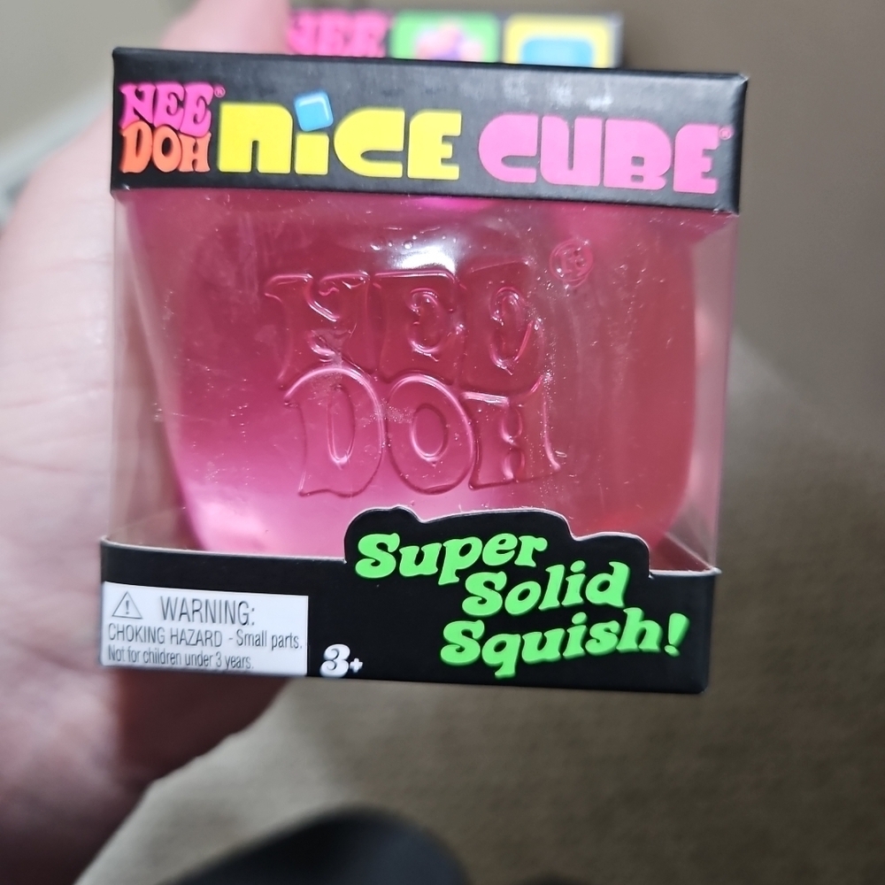 NeeDoh Nice Cube! Squishy Toy - Black Box with Colorful Text